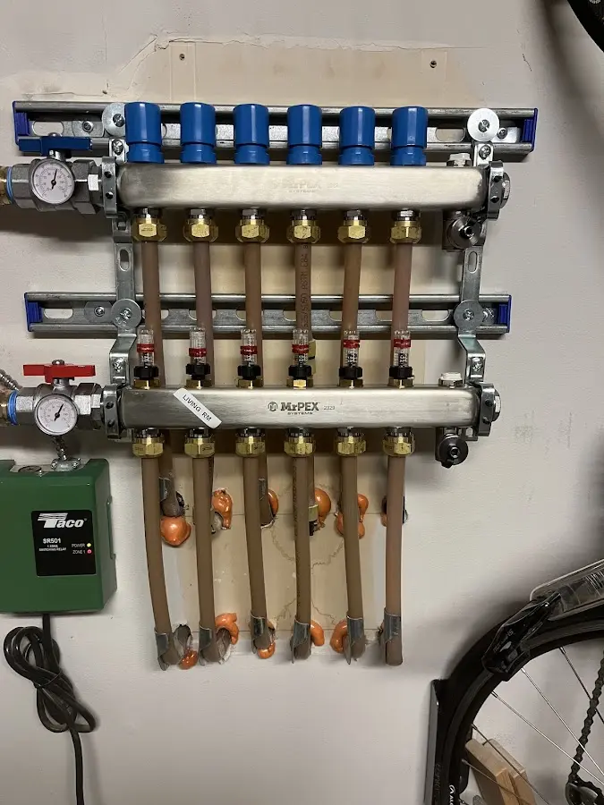 Plumber performing Water Heater Repair at a residential property in Athens